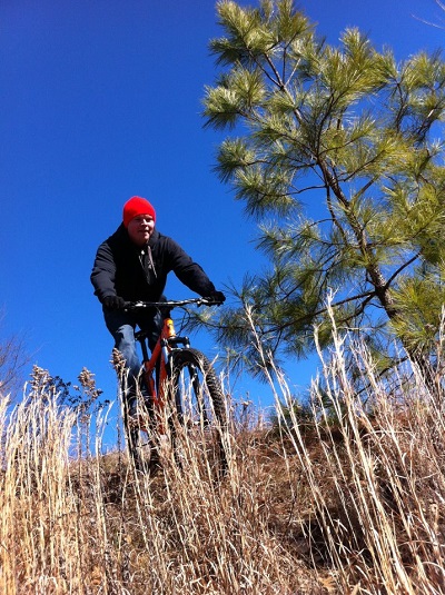 Robert Riding Bicycle